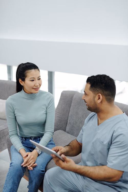 A patient discussing provider choices with a healthcare professional